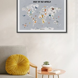 May include: A framed world map with a light blue background and colorful illustrations of animals and landmarks. The map is titled "Map of the World" and includes continents like North America, South America, Europe, Asia, Africa, Australia, and Antarctica.