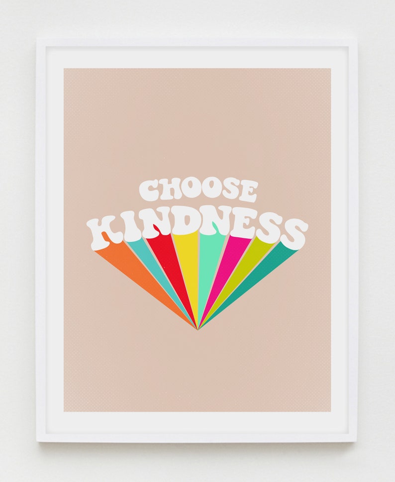 May include: A printable wall art print with a retro-style font that says "Choose Kindness" in white letters on a peach background. The letters are outlined in a rainbow of colors.