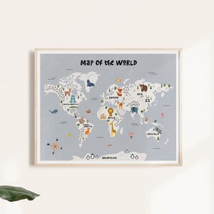 May include: A colorful world map with animals and landmarks. The map is printed on a light blue background and framed in a light wood frame. The title of the map is "Map of the World".