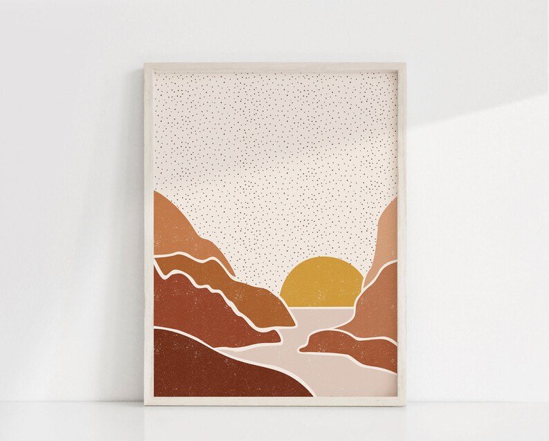 May include: Abstract art print featuring a sunset over a landscape with brown and orange mountains. The sky is filled with small white dots.