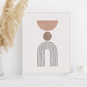 May include: Abstract art print with a pink half-circle, brown circle, and black and white rainbow arch design.