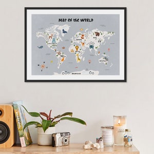 May include: A framed world map with a light gray background and colorful illustrations of animals on each continent. The map includes the text "Map of the World".