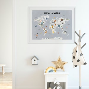 May include: A white framed world map with colorful illustrations of animals on each continent. The map is hanging on a white wall in a room with a white nightstand, a wooden star, and a rainbow toy.