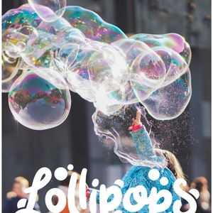May include: A child in a blue jacket reaches towards a cluster of iridescent bubbles. The image features the text "Lollipops KIDS ACADEMY" in a playful, white font, suggesting a children's activity or educational program.
