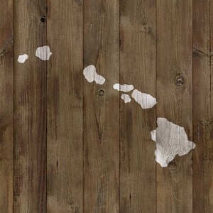 May include: A white outline of the Hawaiian islands on a brown wooden background.