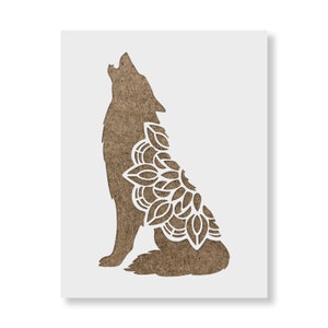 May include: A brown wolf silhouette stencil with a white mandala design on its back. The stencil is made of a brown material and is ready to be used for crafting projects.