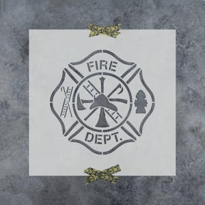 May include: A square stencil featuring a dark gray Fire Dept. emblem with a central helmet, crossed axes, a ladder, and a fire hydrant. The word FIRE is arched above the emblem, and DEPT. is arched below, all within a decorative border.