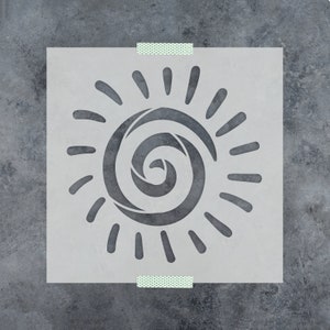 May include: A white stencil with a sun design. The sun has a spiral in the center and rays extending out from the center.