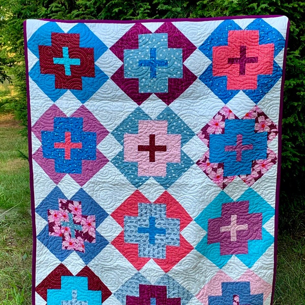 Available now: Bright and modern Throw size quilt