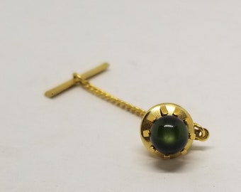 Vintage gold tone dark green moon glow tie tack with bar and chain