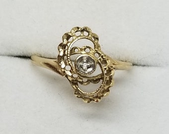 Vintage 10kt gold and tiny diamond knot filigree ring size 6