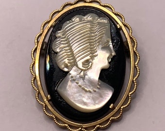 Vintage Krementz Black Onyx and Mother of Pearl carved cameo brooch pendant gold plated