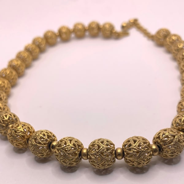 Vintage Monet Gold tone Filigree ball necklace