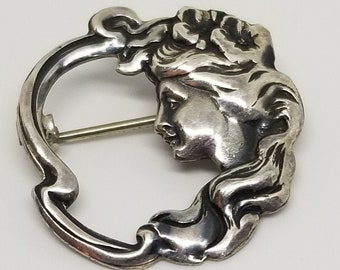 Antique Art Noveau style sterling silver womans face small brooch