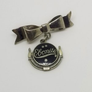 Vintage Ebonite bowling ball sterling bow dangle brooch