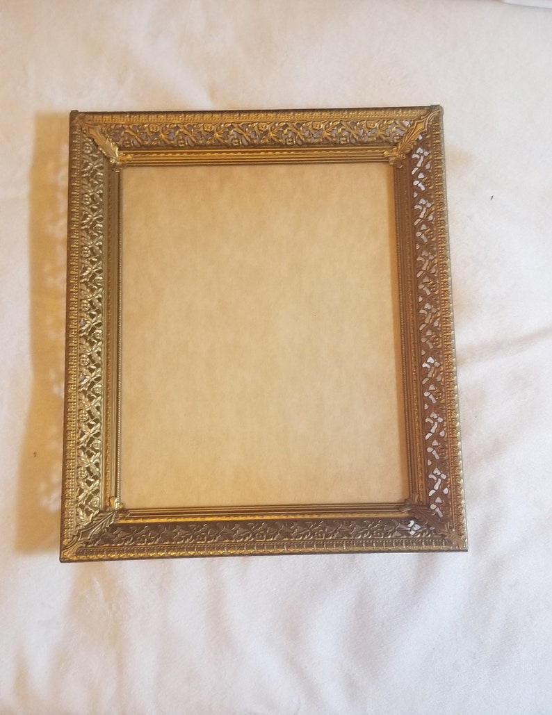 Vintage 8x10 gold tone hanging horizontal vertical picture frame thick cut out floral filigree