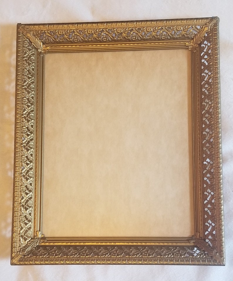 Vintage 8x10 gold tone hanging horizontal vertical picture frame thick cut out floral filigree