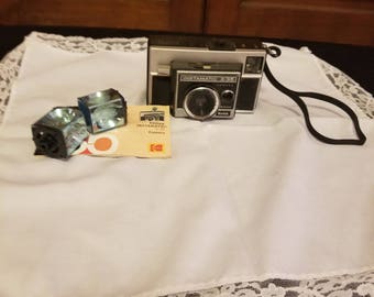 Instamatic x-35 Camera with flash cubes and manual