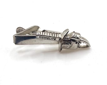 Vintage Homelite chainsaw silver tone tie clip