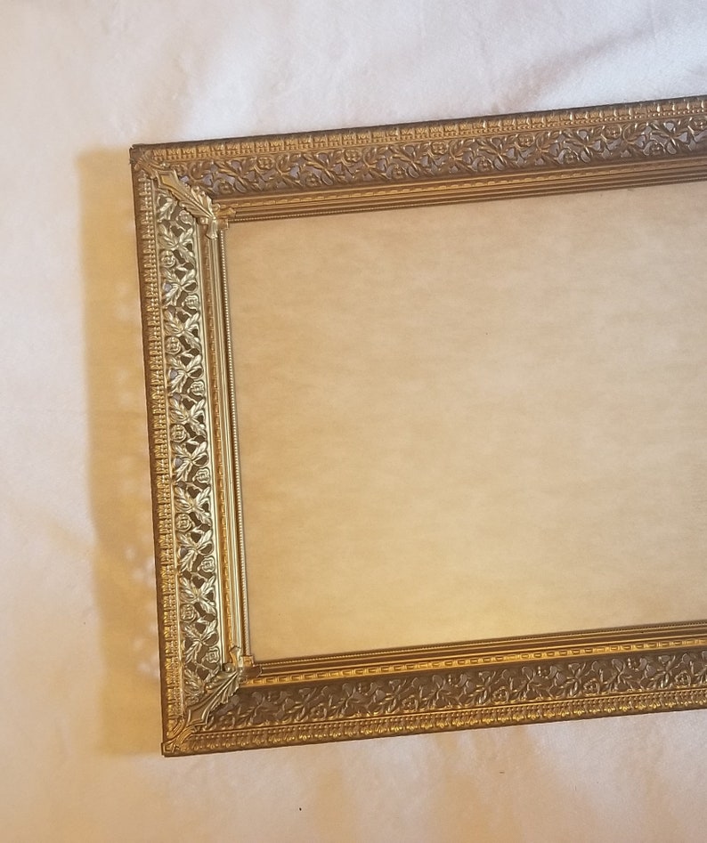 Vintage 8x10 gold tone hanging horizontal vertical picture frame thick cut out floral filigree
