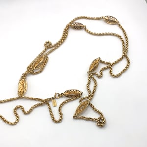 Vintage Monet gold tone station necklace extra long 52 inch
