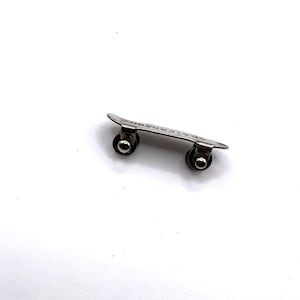 pendentif skateboard articulé vintage en argent sterling 925