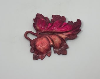 Vintage dark red and peach plastic leaf brooch