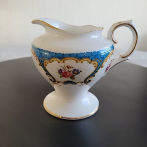 Vintage Crown Staffordshire fine bone China milk Jug.