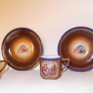 Two Vintage Haas & Czjzek Demitasse Cup and Saucer Sets, Hand-Painted, Gold Gilded, and Made in Czechoslovakia (Between 1945 and 1992)