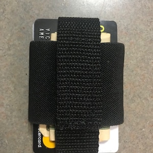 Cartera minimalista elástica