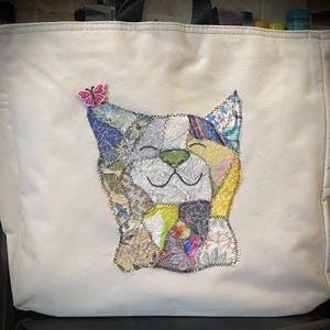 May include: A rustic wooden sign with the text "Welcome to our home" in white lettering. The sign features a distressed finish and a simple, inviting design, perfect for entryway decor.