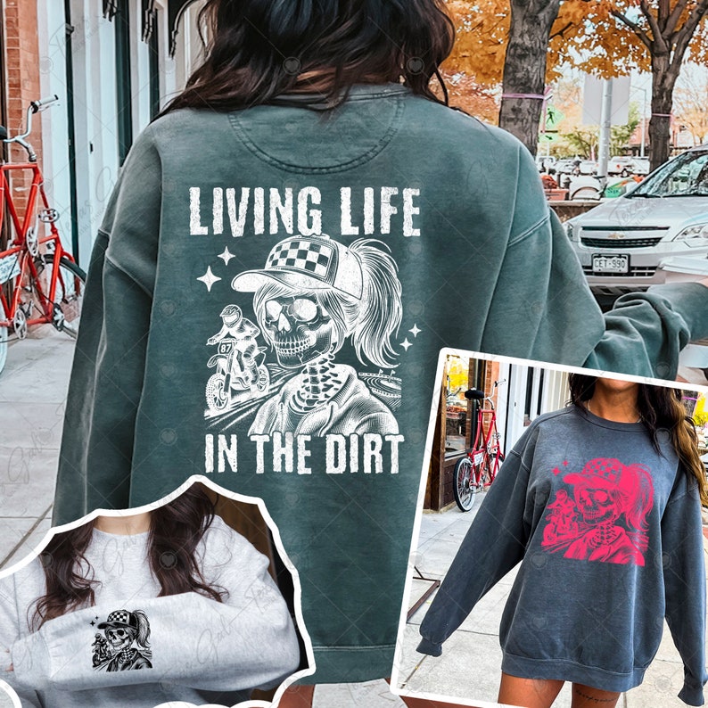 May include: Three sweatshirts with a graphic print of a skeleton woman riding a dirt bike. The text on the sweatshirt says "Living Life in the Dirt".