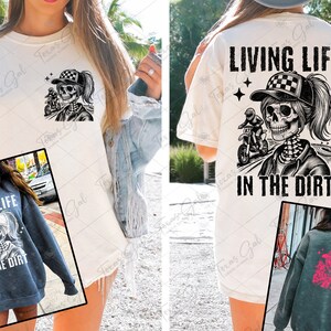 May include: A white t-shirt with a black and white graphic of a skeleton riding a dirt bike with the text "LIVING LIFE IN THE DIRT".