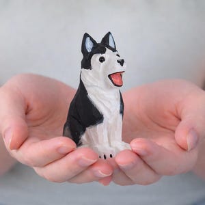 Cane di legno bianco e nero, metodo Montessori