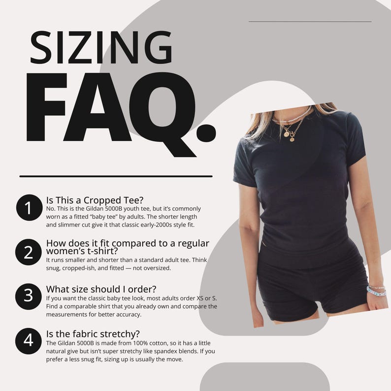 May include: A black short-sleeved t-shirt worn with black shorts. The image includes text titled SIZING FAQ. with four numbered points explaining the fit of the Gildan 5000B youth tee, noting it is 100% cotton and often worn as a fitted baby tee.