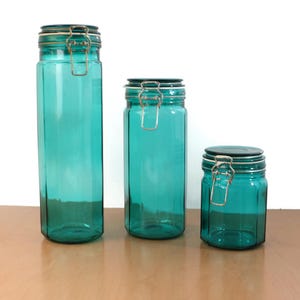 Juego de botes de cocina de vidrio color verde azulado vintage con cierres de alambre