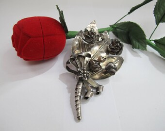 Antique sterling silver pin of flowers