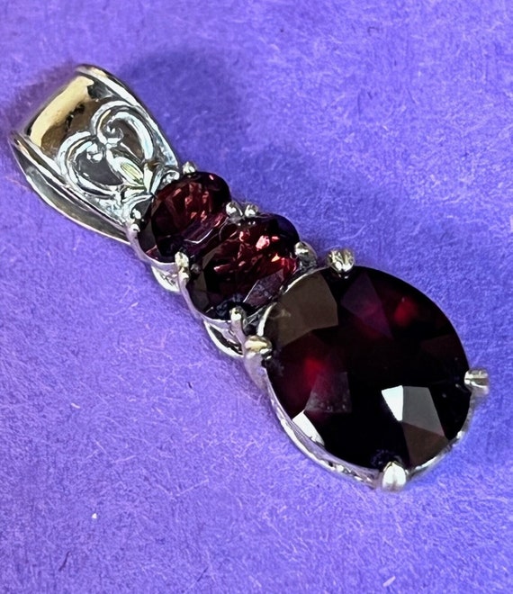 Sterling Silver with Gold-tone Accent Garnet Penda