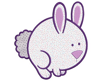 May include: A purple outlined cartoon bunny with a white body covered in small pink and blue dots. The bunny has a fluffy gray tail and is standing on all fours.