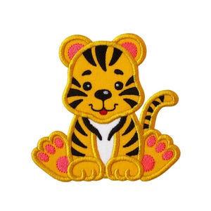 May include: Embroidered patch of a cartoon tiger cub in a sitting position. The tiger has yellow fur with black stripes, pink paw pads, and a white chest. The patch is outlined in yellow.