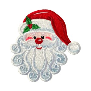 May include: An embroidered patch featuring the face of Santa Claus with a white curly beard, a red nose, and rosy cheeks. Santa wears a red hat with a white pom-pom and a green holly leaf with red berries on the brim, all rendered in thread.