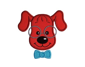 May include: Embroidered patch featuring a red dog with round glasses and a blue bow tie. The dog has a black nose and a smiling expression. The patch is likely for clothing or accessories.
