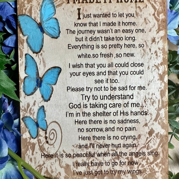 Plaque commémorative gravée en forme de papillon en bouleau : « I made it home »