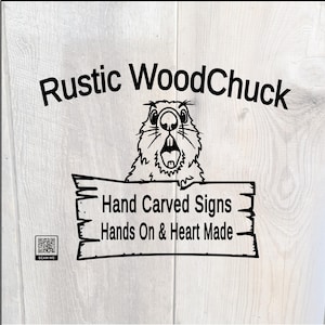 Rustic WoodChuck hand carved wooden signs, logo. it is an image with Rustic WoodChuck at the top slightly arched. under my business name is a WoodChuck holding a sign that state Hand Carved Sign, Hands on & Heart Made. the image is on a rustic Wethered Grey barn wood backdrop.