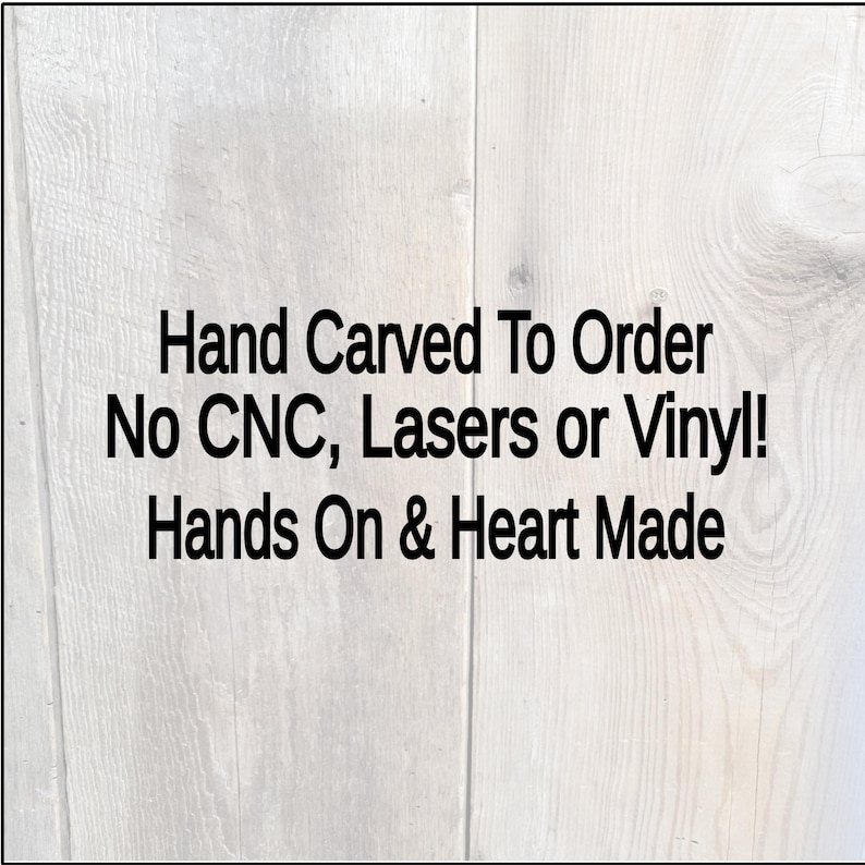 this is a details photo that says, Hand Carved To order. No CNC, Lasers or Vinyl. Hands on & Heart made displayed on a weathered gray barn wood backdrop