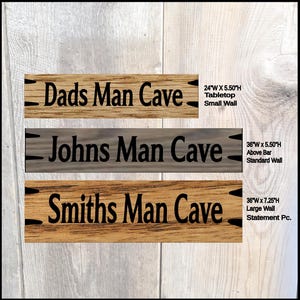 Hand Carved Man Cave Wooden Sign Size chart from the drop-down menu. 3 sizes to choose from 24 In. Wide x 5.50 In. High, perfect for tabletops or small walls, 36 in. Wide x 5.50 in. High. perfect for above the bar or small walls, 36 in. Wide x 7.25 In. High. Perfect for Above the Bar, Large Walls, Statement Piece.