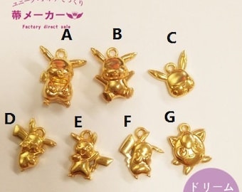 Puede incluir: Encantos de metal de color dorado con diferentes personajes de dibujos animados. Los encantos están dispuestos en dos filas sobre un fondo blanco. El texto "滴のゼリー金属フレーム" está escrito en japonés en la parte inferior de la imagen.