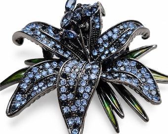 Blue Crystal Lily Brooch, Gunmetal-Tone Floral Statement Pin with Green Leaves