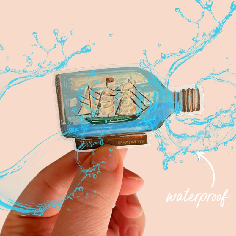 May include: A clear glass bottle with a cork stopper containing a miniature ship. The bottle is surrounded by blue water droplets, indicating it is waterproof.
