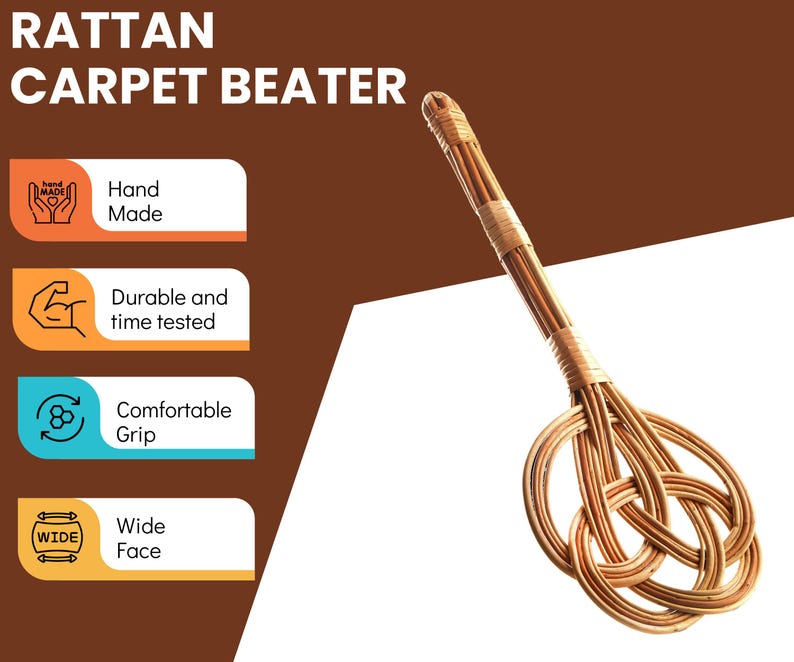 May include: A brown rattan carpet beater with a wide, flat face and a comfortable grip. The beater is hand-made and durable.